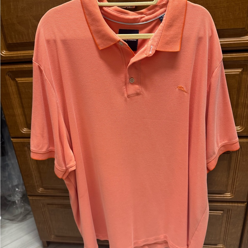 Tommy Bahama coral Polo Shirt.  Excellent condition.  Relax comfy fit!